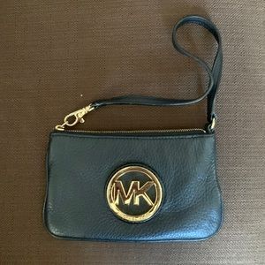 Michael Kors leather pebbled leather zip up wristlet purse